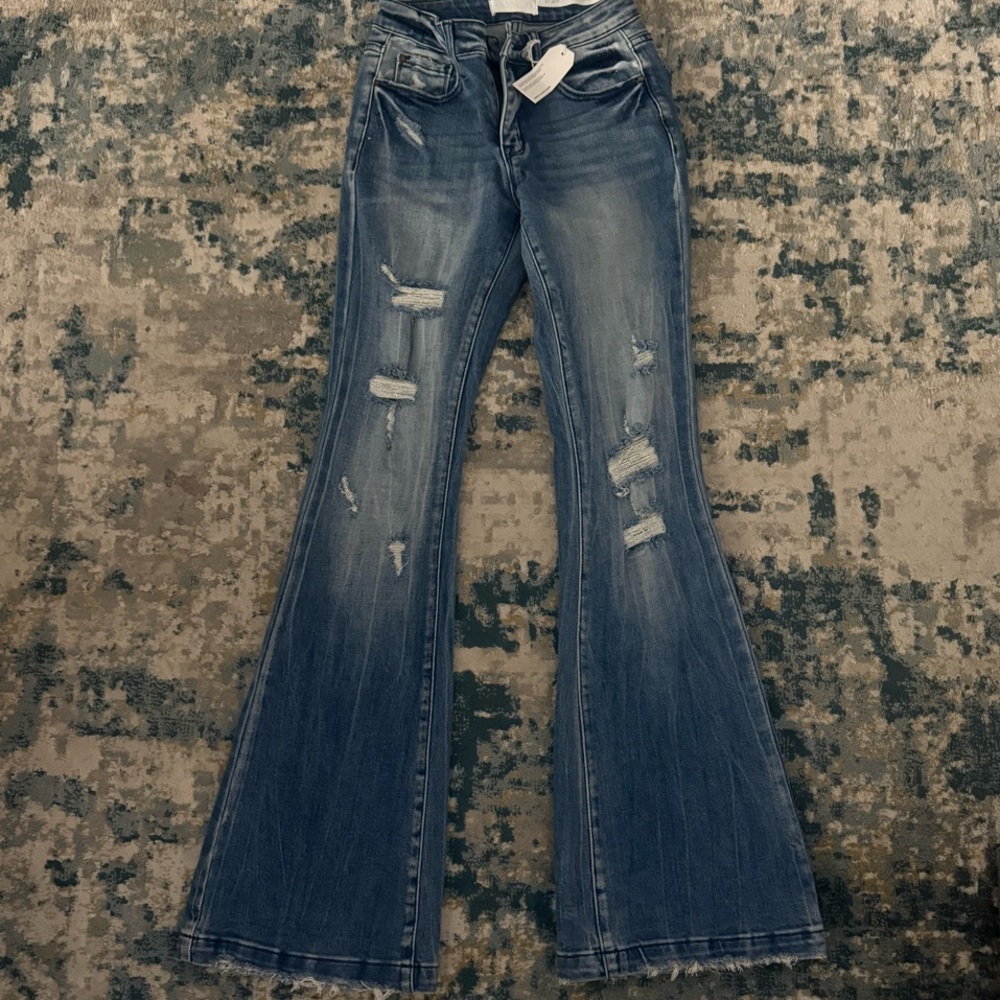 Blue Flare Wide Leg Jeans with Distressed Details